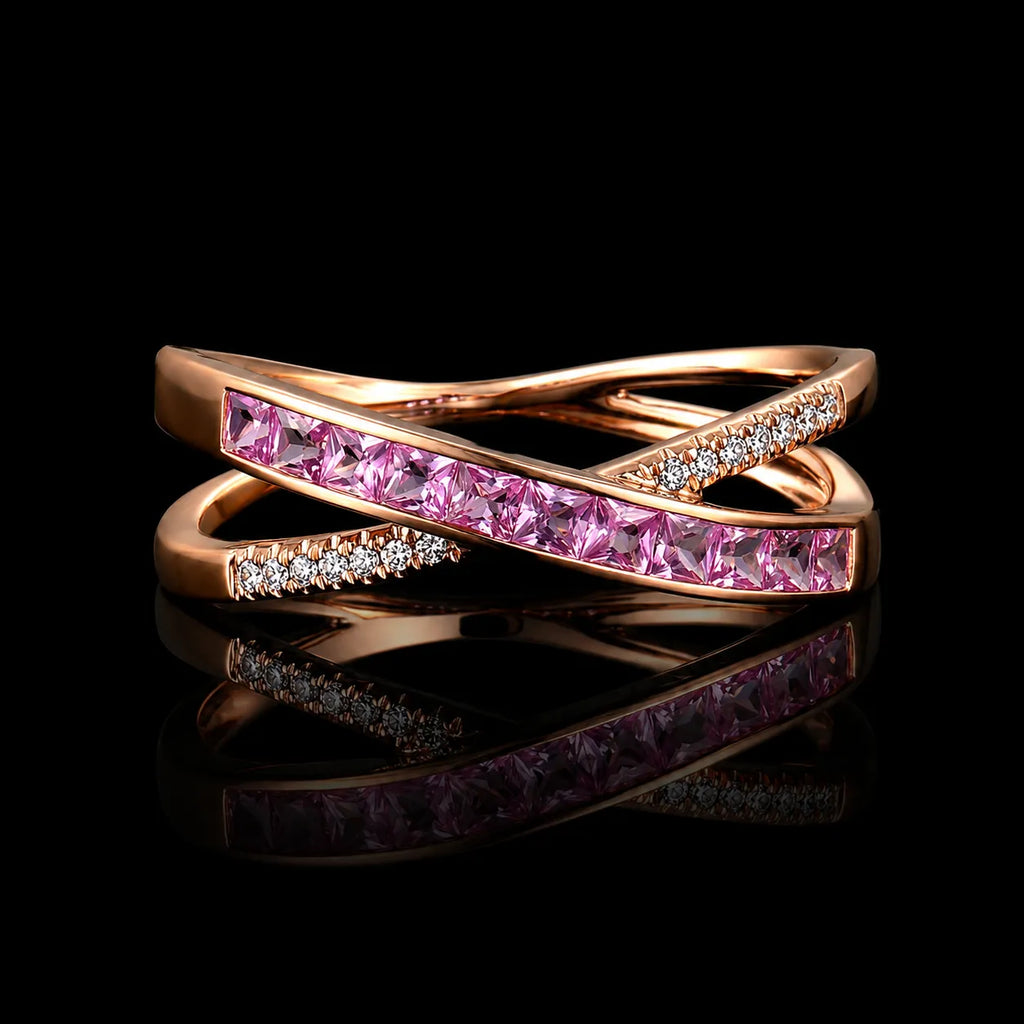 MUHUANG ruby and diamond earrings on dark satin, highlighting pink gemstones and gold craftsmanship