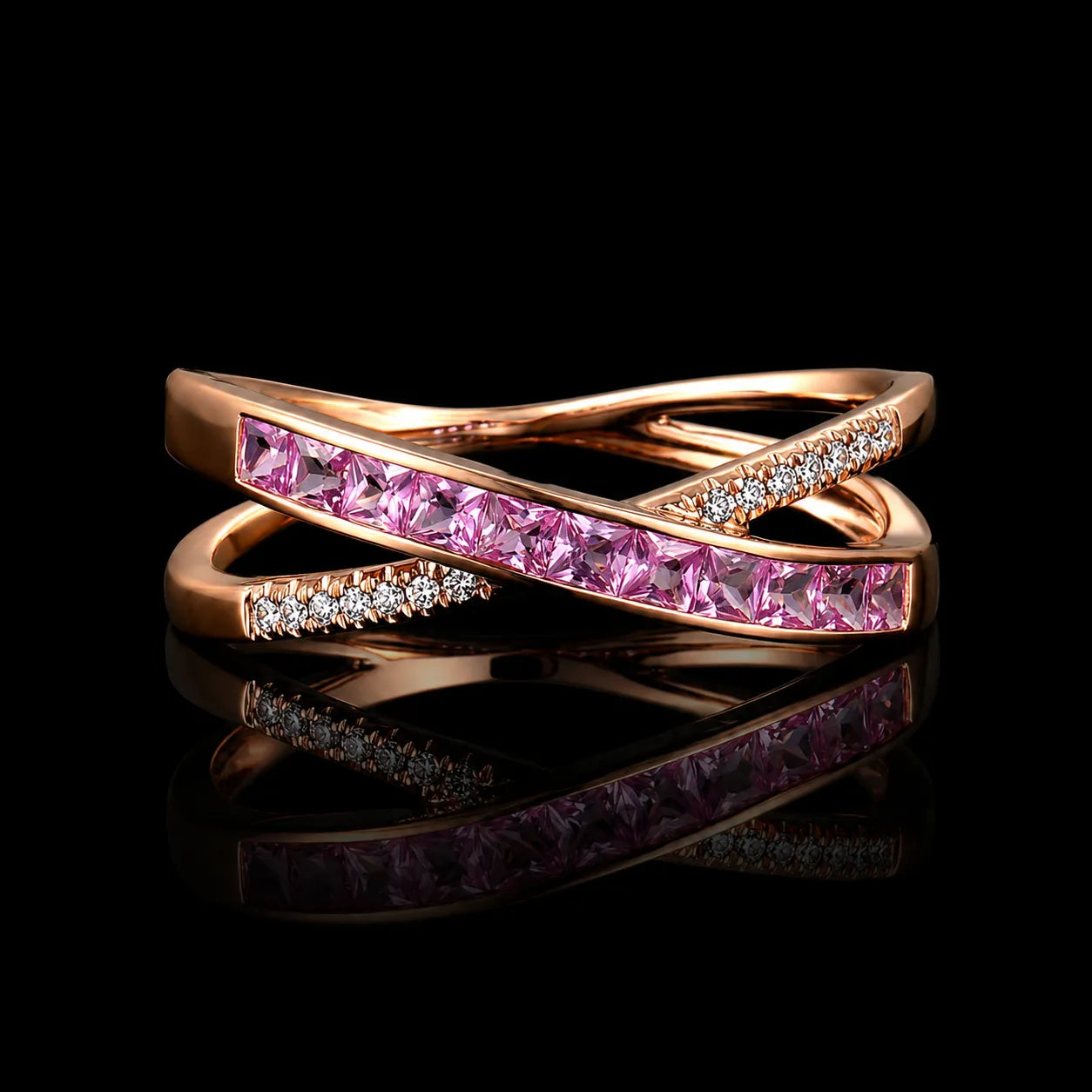 MUHUANG ruby and diamond earrings on dark satin, highlighting pink gemstones and gold craftsmanship
