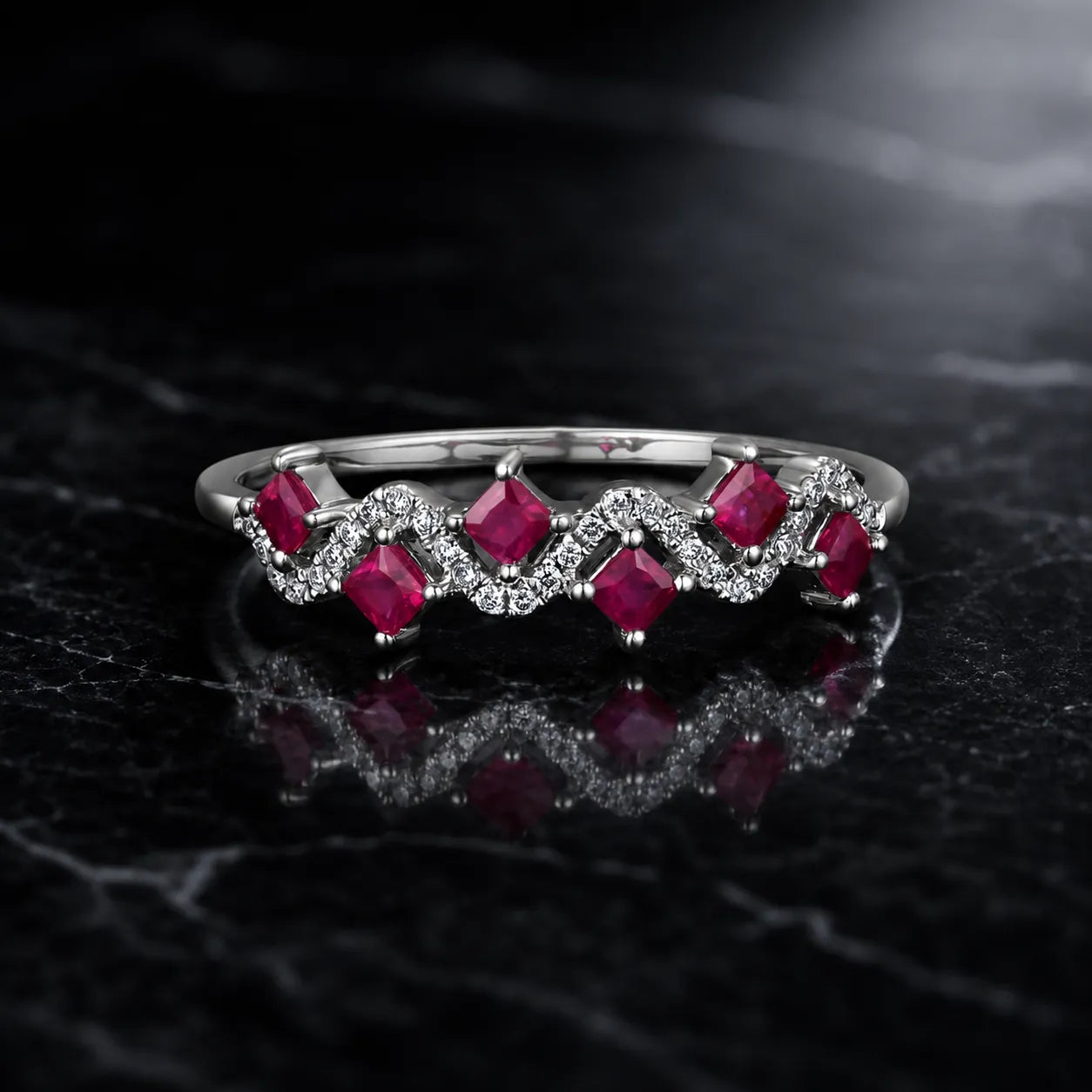 MUHUANG white gold ruby ring with diamond wave design on black marble background