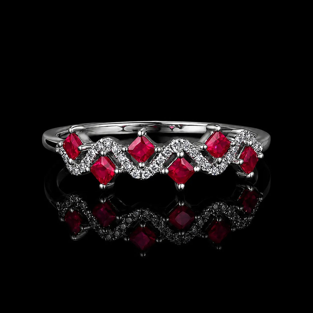 MUHUANG ruby and diamond wave ring in white gold on black background