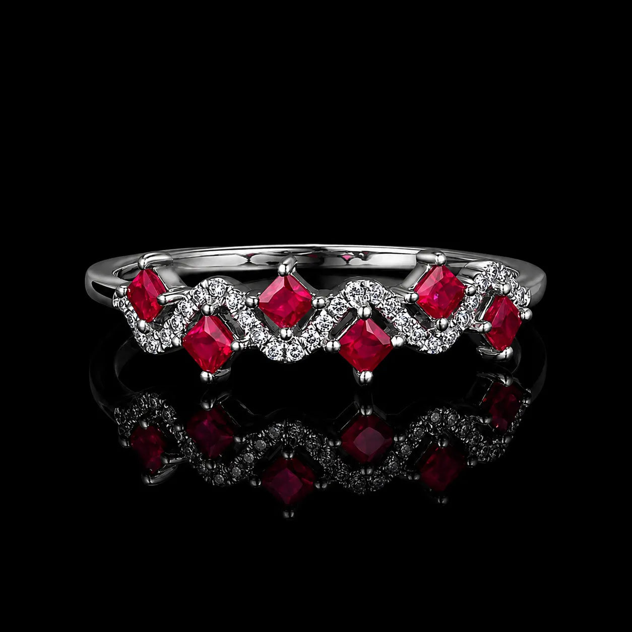 MUHUANG ruby and diamond wave ring in white gold on black background