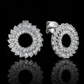 MUHUANG white gold baguette diamond hoop earrings on black background