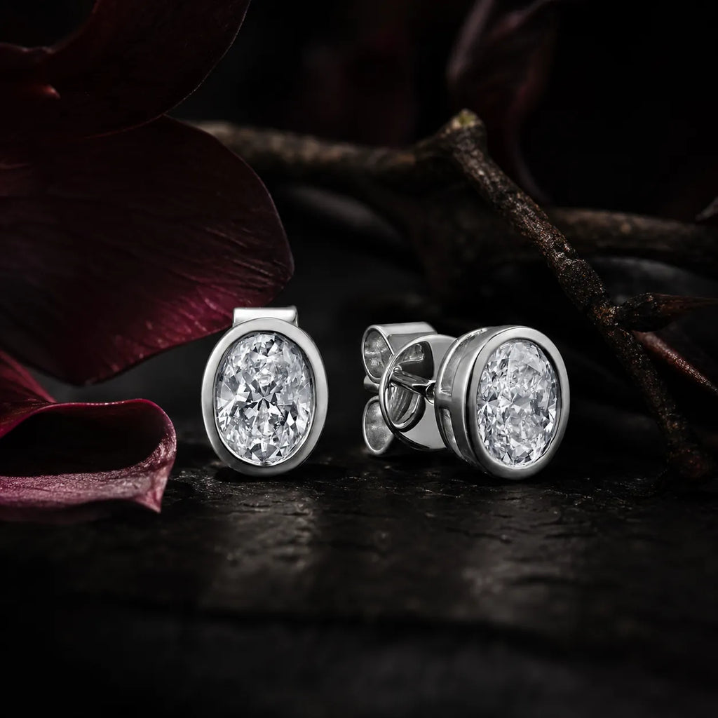 MUHUANG white gold oval diamond stud earrings with dark floral background