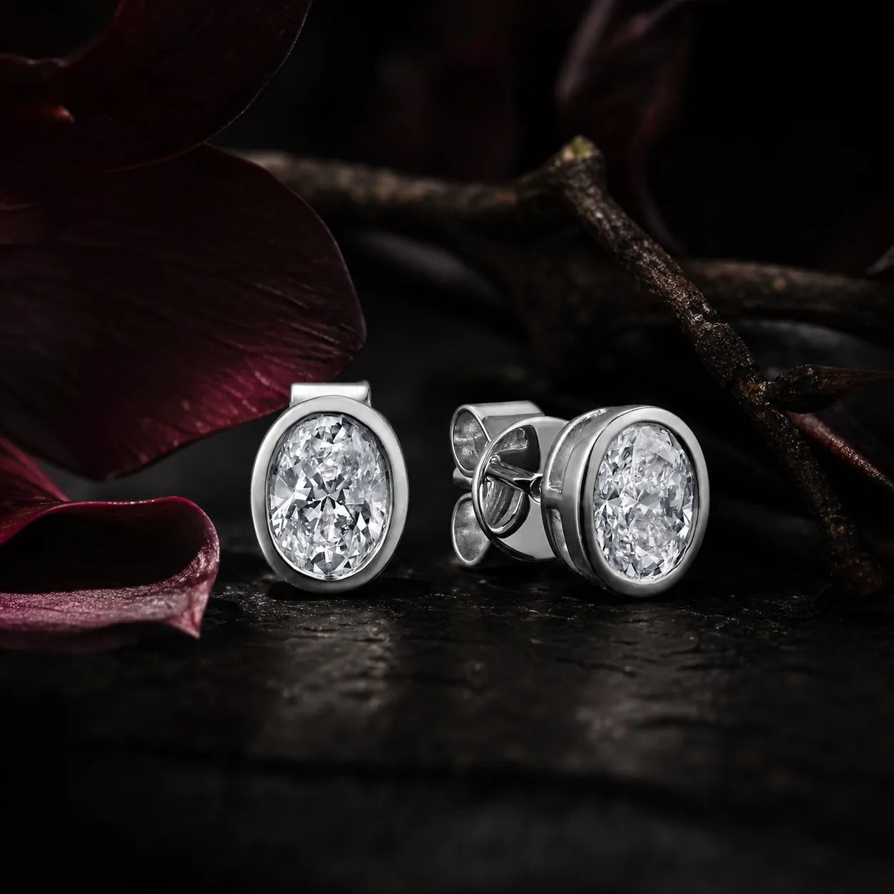 MUHUANG white gold oval diamond stud earrings with dark floral background