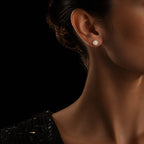 MUHUANG yellow gold diamond stud earring worn with black evening dress