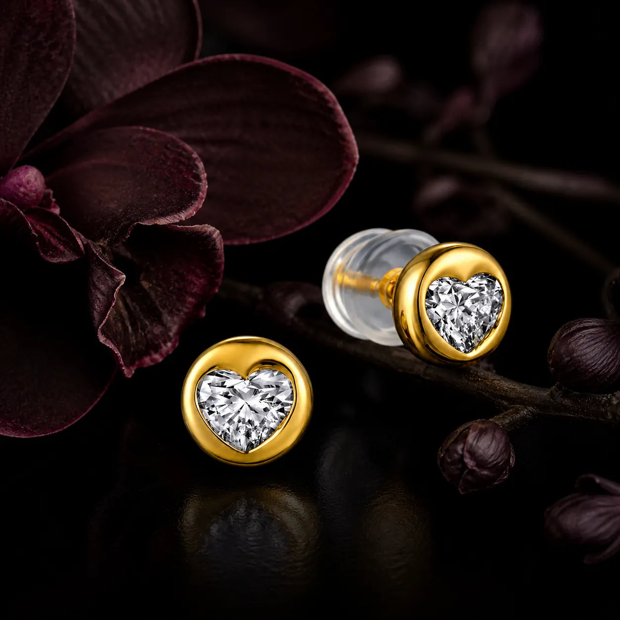 MUHUANG yellow gold heart diamond stud earrings with dark floral background