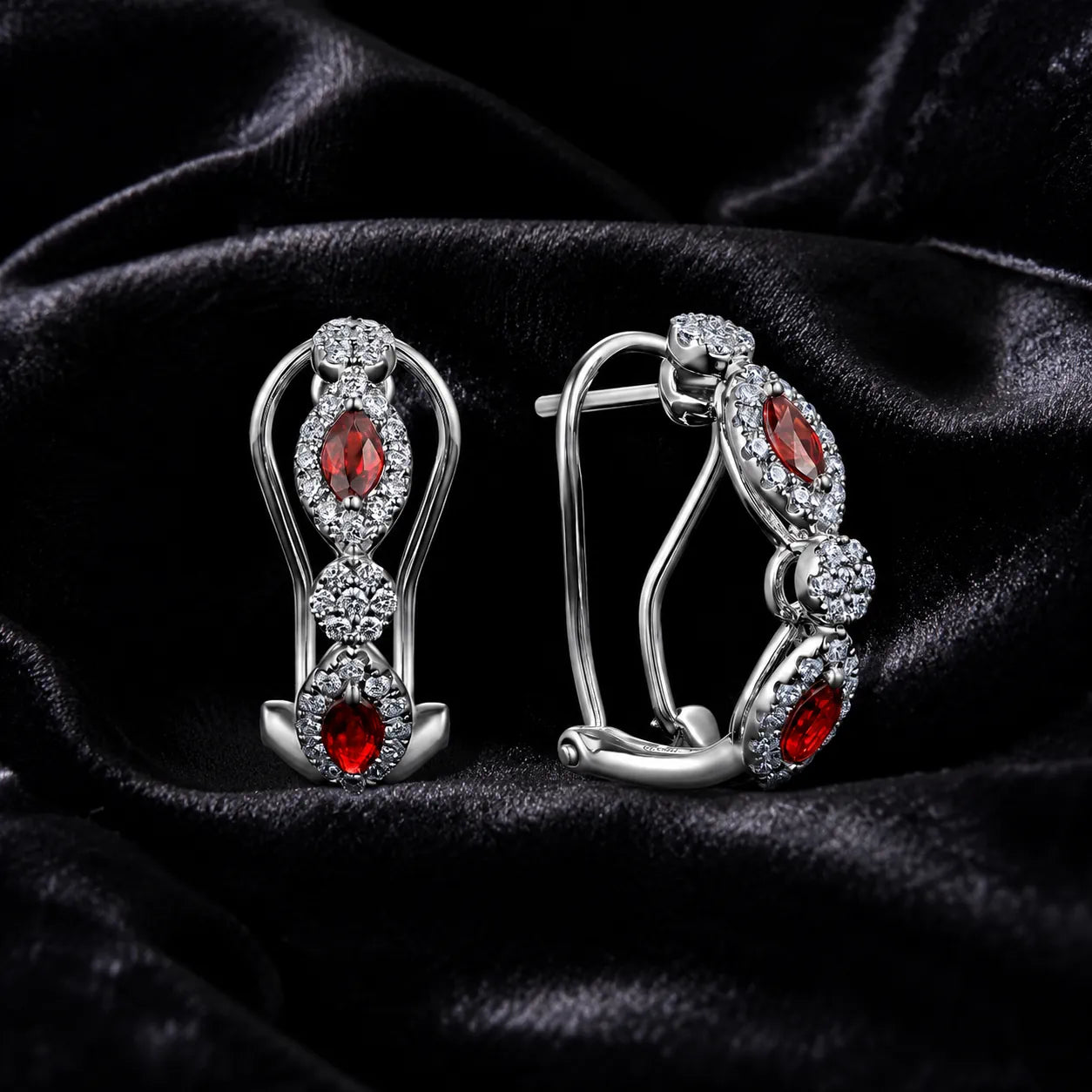 MUHUANG white gold ruby and diamond drop earrings on black satin