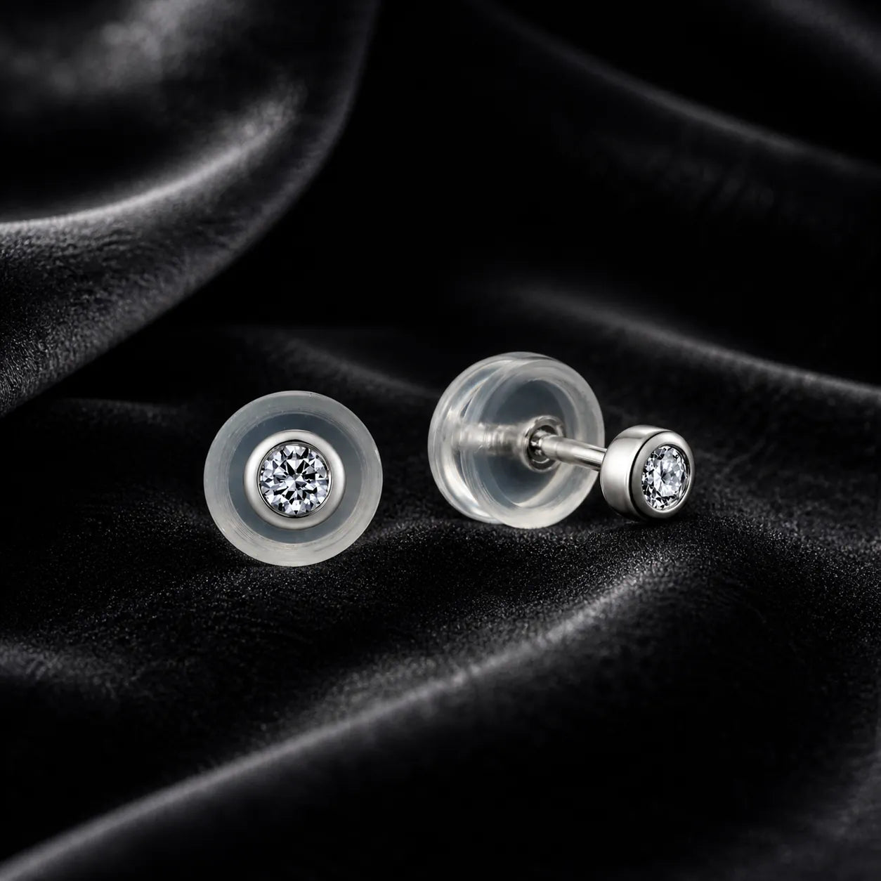 MUHUANG diamond stud earrings on black velvet background