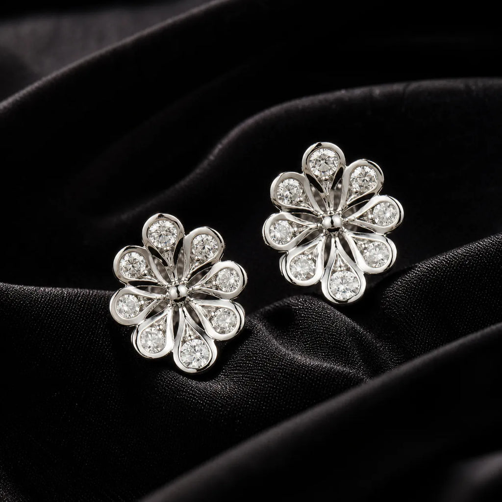 MUHUANG white gold flower diamond stud earrings on black velvet