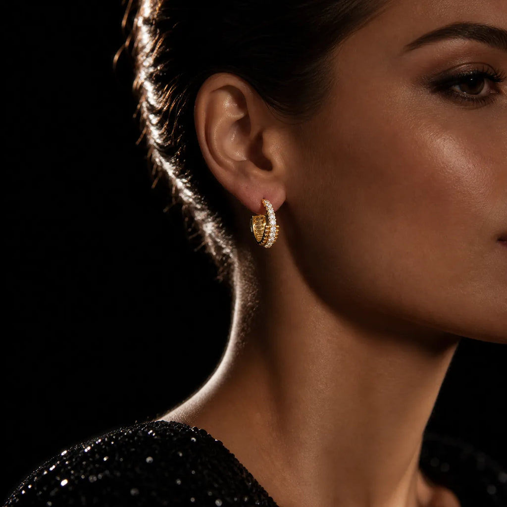 MUHUANG yellow gold diamond hoop earrings worn by model