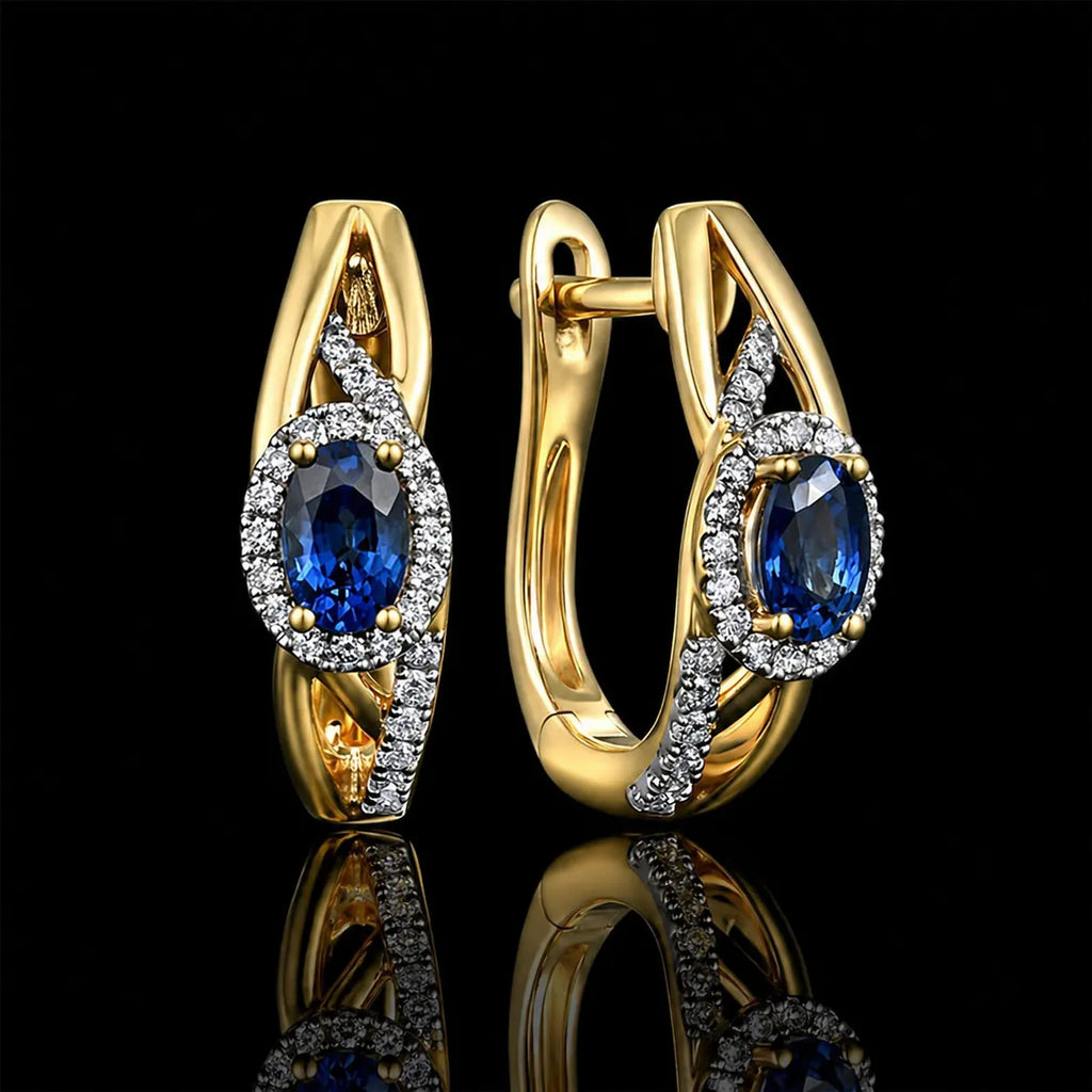 MUHUANG yellow gold blue sapphire diamond hoop earrings on black background