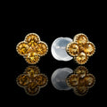 MUHUANG yellow gold four leaf clover citrine stud earrings on black reflective background
