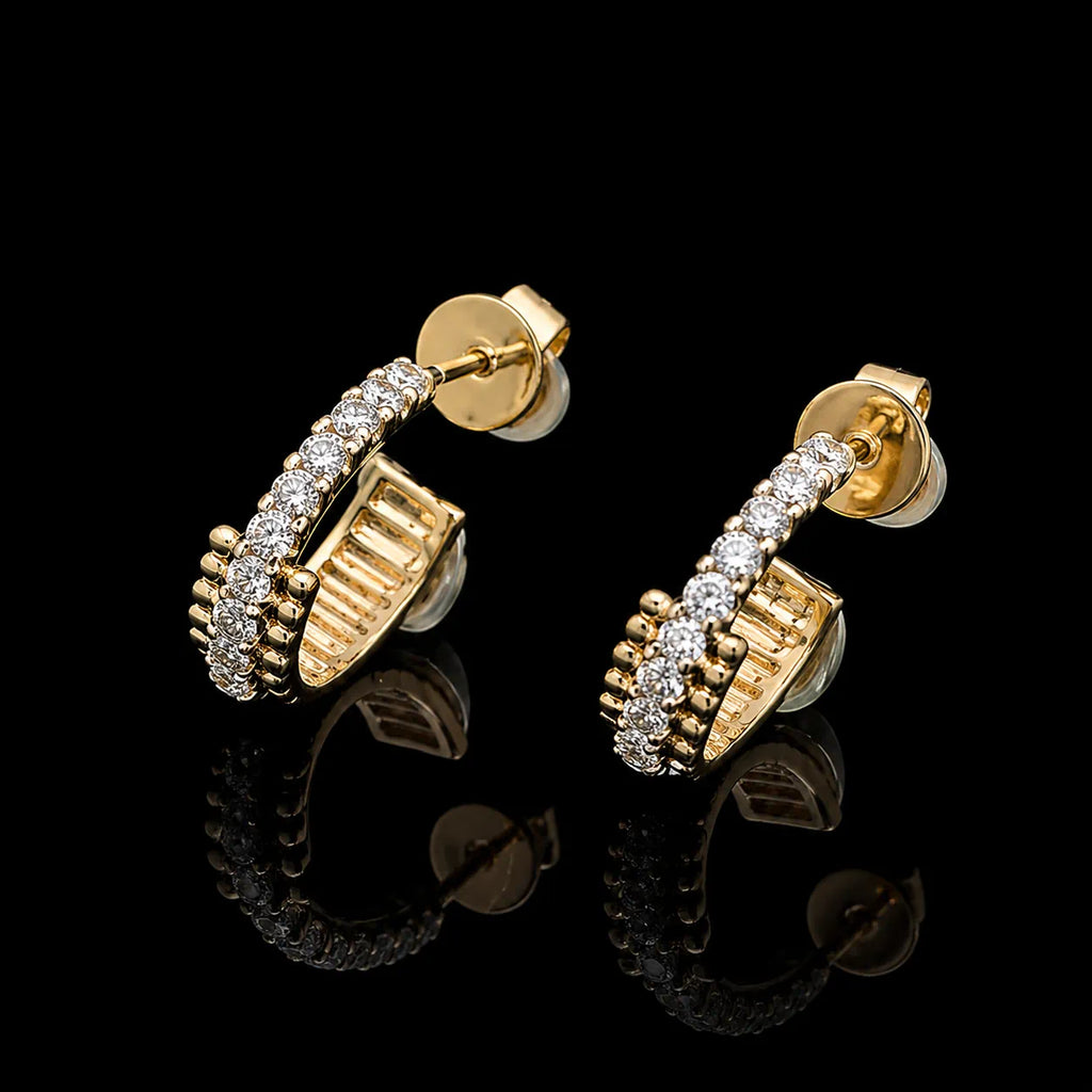 MUHUANG yellow gold diamond hoop earrings on black background