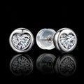 MUHUANG white gold heart shaped diamond stud earrings on black background
