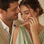 Couple sharing engagement moment, woman wearing yellow diamond engagement ring with cushion-cut center and white accent diamonds
