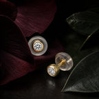 MUHUANG yellow gold diamond stud earrings on burgundy petals