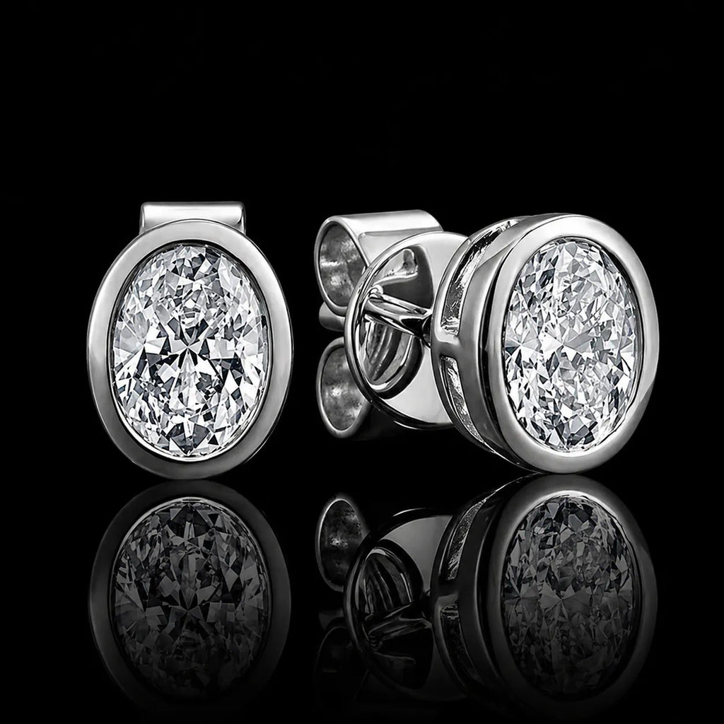 MUHUANG white gold oval diamond stud earrings on black background