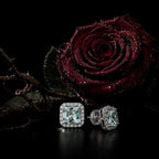 MUHUANG light blue gemstone stud earrings with diamond halo placed with dark red rose, conveying romantic and luxurious jewelry aesthetic.