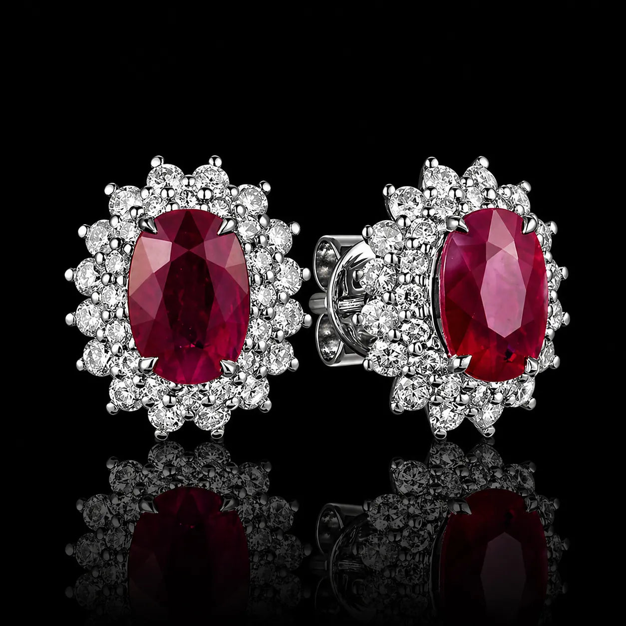 MUHUANG ruby and diamond halo stud earrings on black background