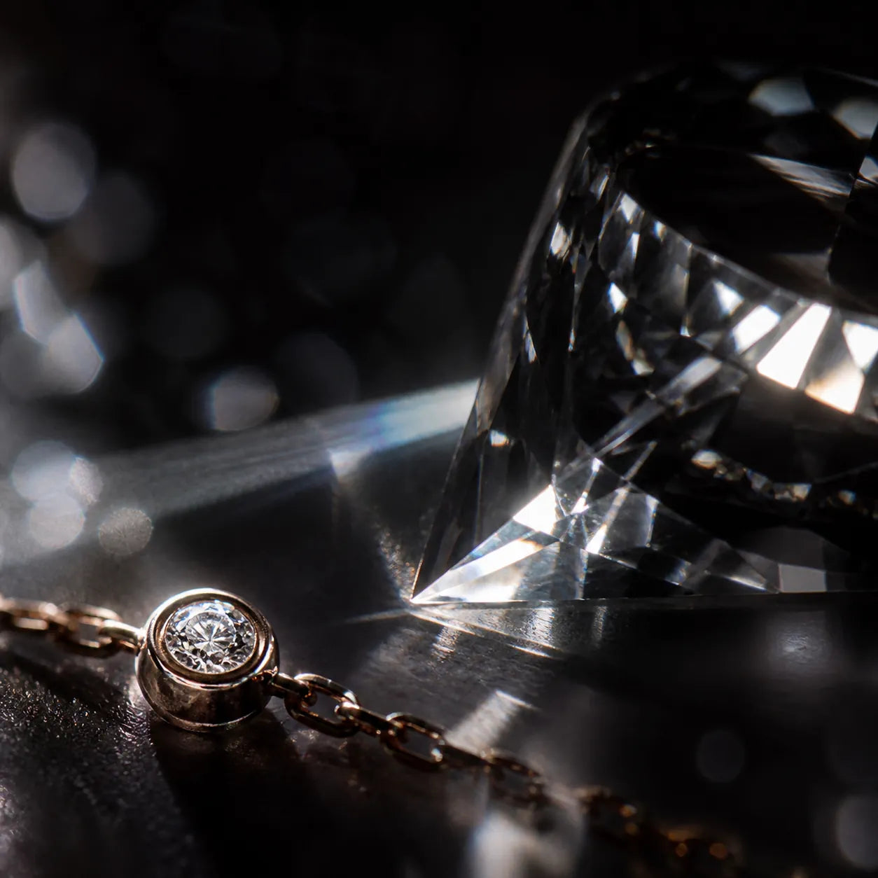 MUHUANG rose-gold bracelet with diamonds placed among crystal reflections on black surface, emphasizing luxury and sparkle.