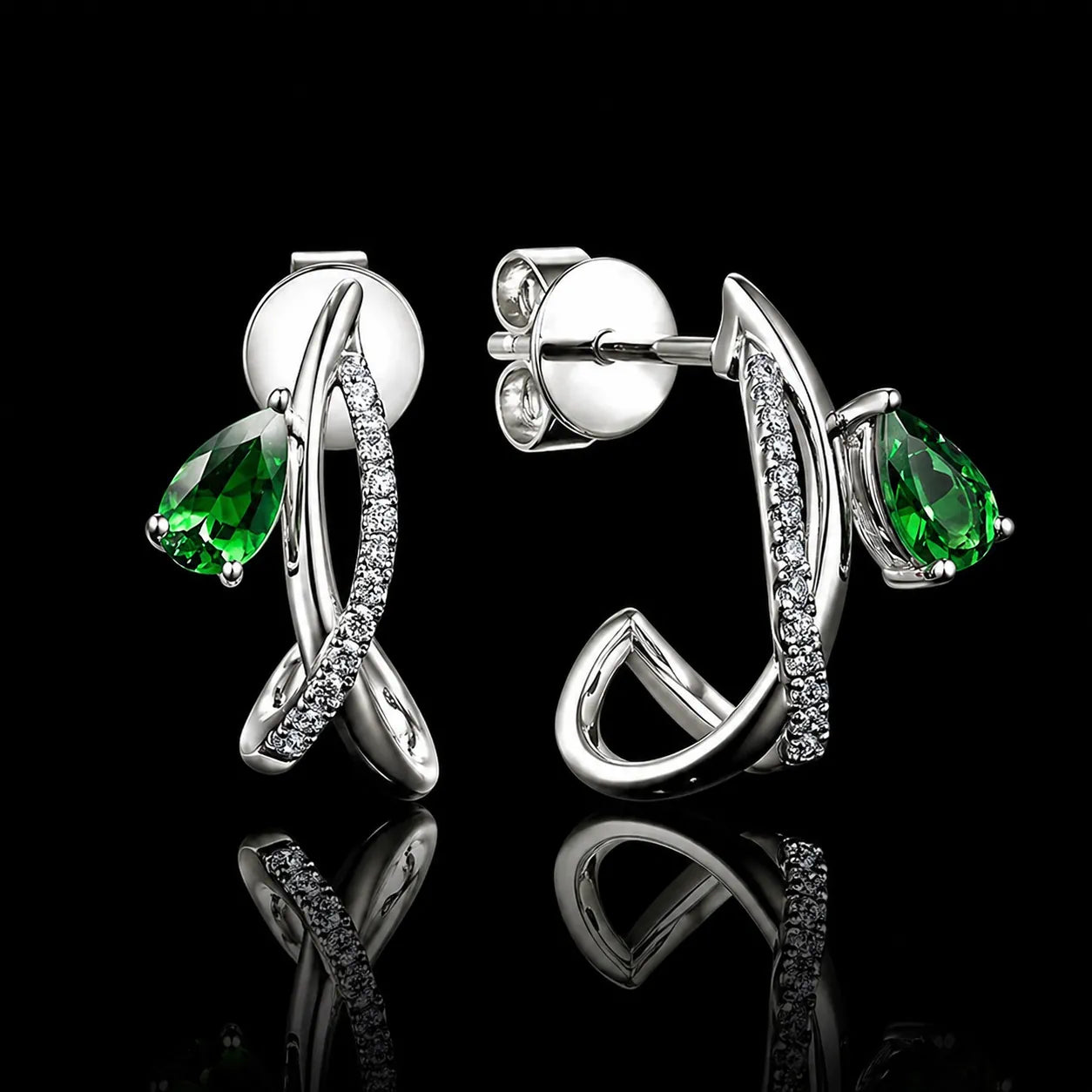 MUHUANG white gold green gemstone drop earrings on black background