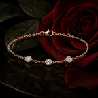MUHUANG rose-gold bracelet with three diamonds positioned beside a dark red velvet rose, conveying romantic and luxurious aesthetic.